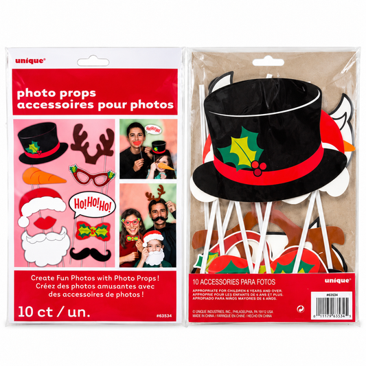 A 10-piece set of Christmas photo props in retail packaging, including a black top hat with a red band and green holly accent, Santa hat, reindeer antlers, carrot, glasses, mustache, bow tie, beard, and holiday hat pieces.