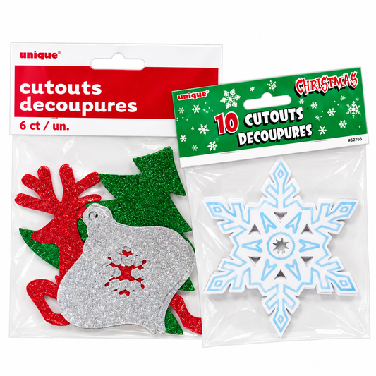 Two packages of Unique brand Christmas cutouts on a white background. One package contains glittery red, green, and silver holiday shapes, and the other contains a light blue and white snowflake cutout.