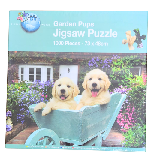 Garden Pups Jigsaw Puzzle packaging with two puppies in a wheelbarrow.