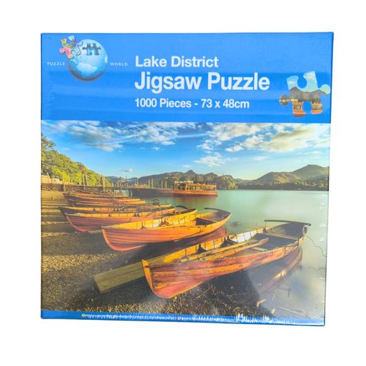 Lake District Jigsaw Puzzle packaging with scenic image of boats on a lake.