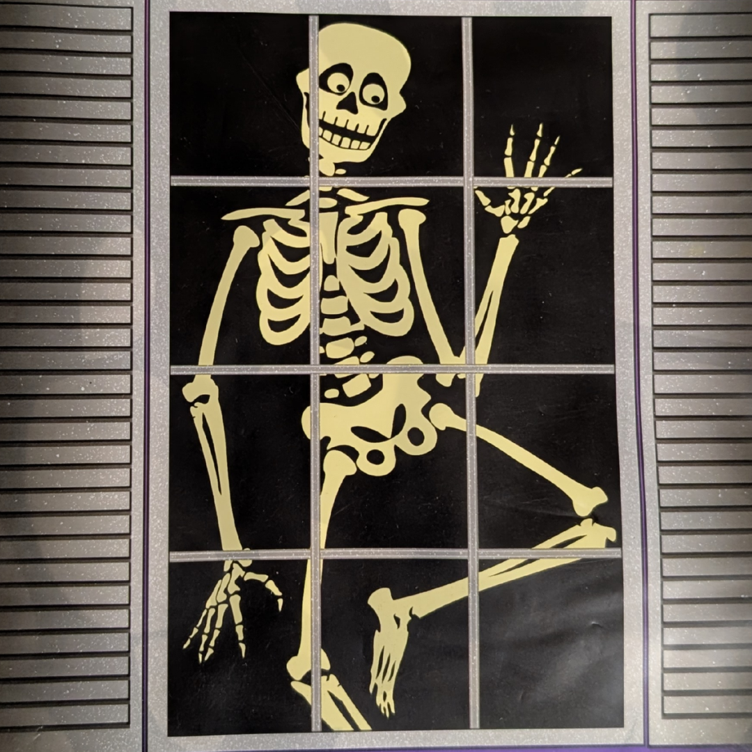 Friendly Skeleton Window Silhouette
